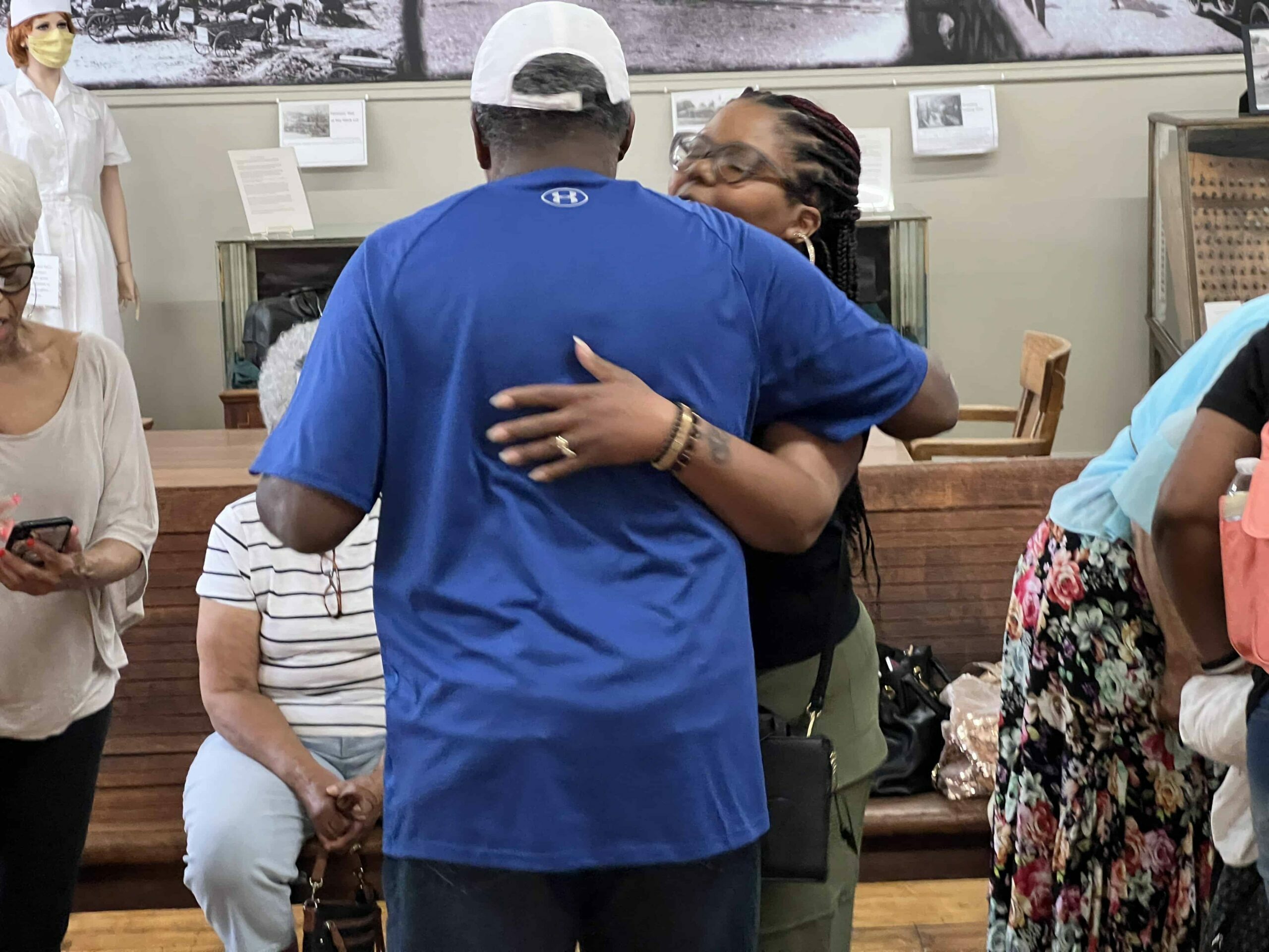 Million-Finley family members embrace in hugs