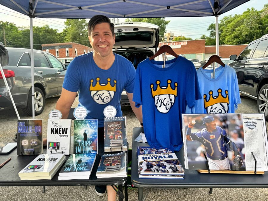 Matt Stewart at a booth with his published books