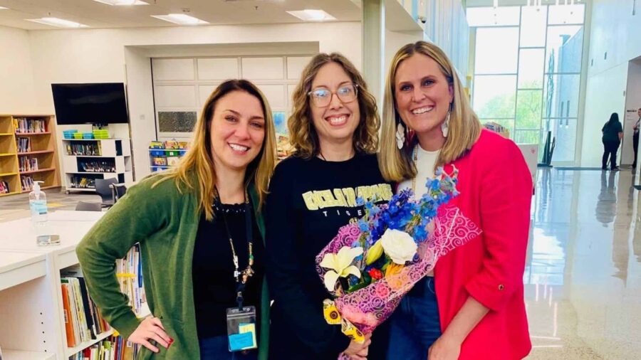 Cornerstone's Abby Turner celebrates her award with friends and colleagues.